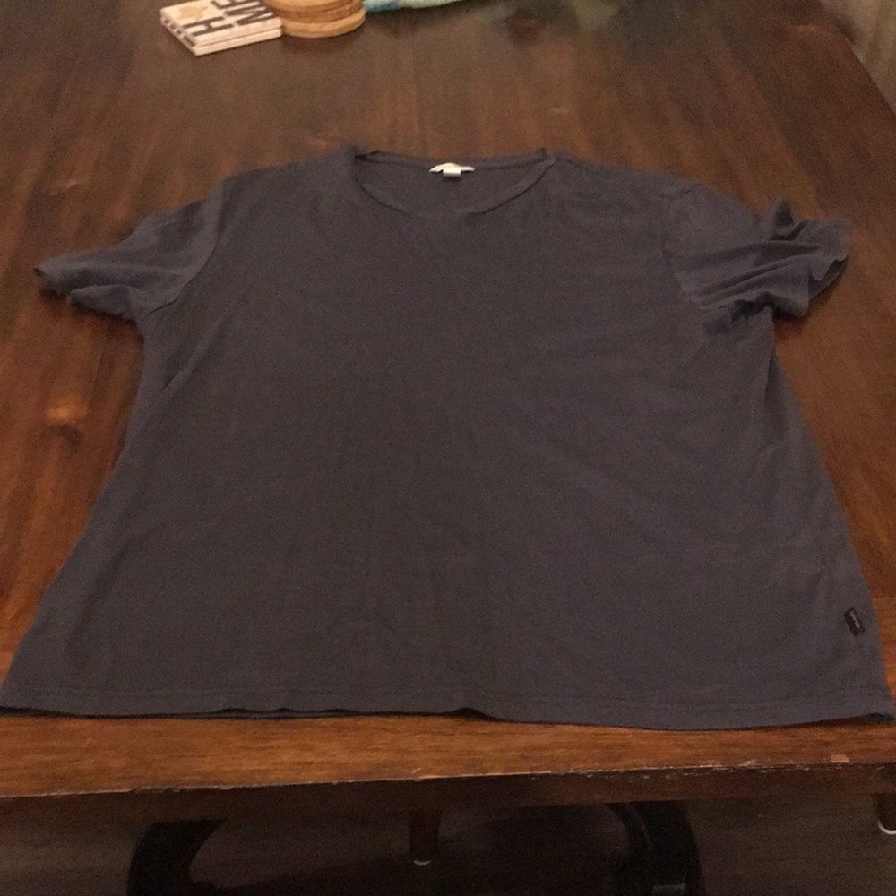 Large black Calvin Klein short sleeve shirt.